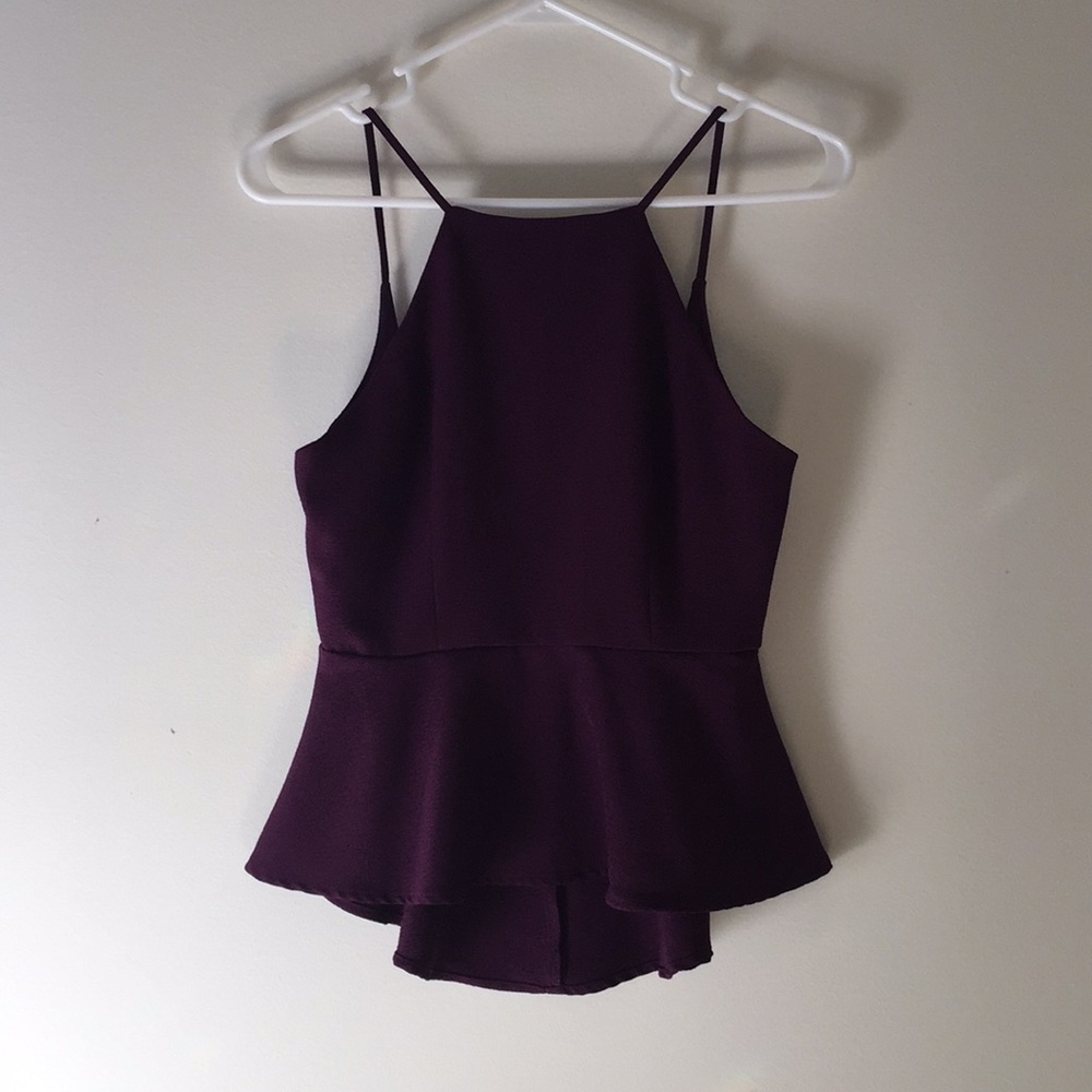 Plum colored peplum top, swoop back